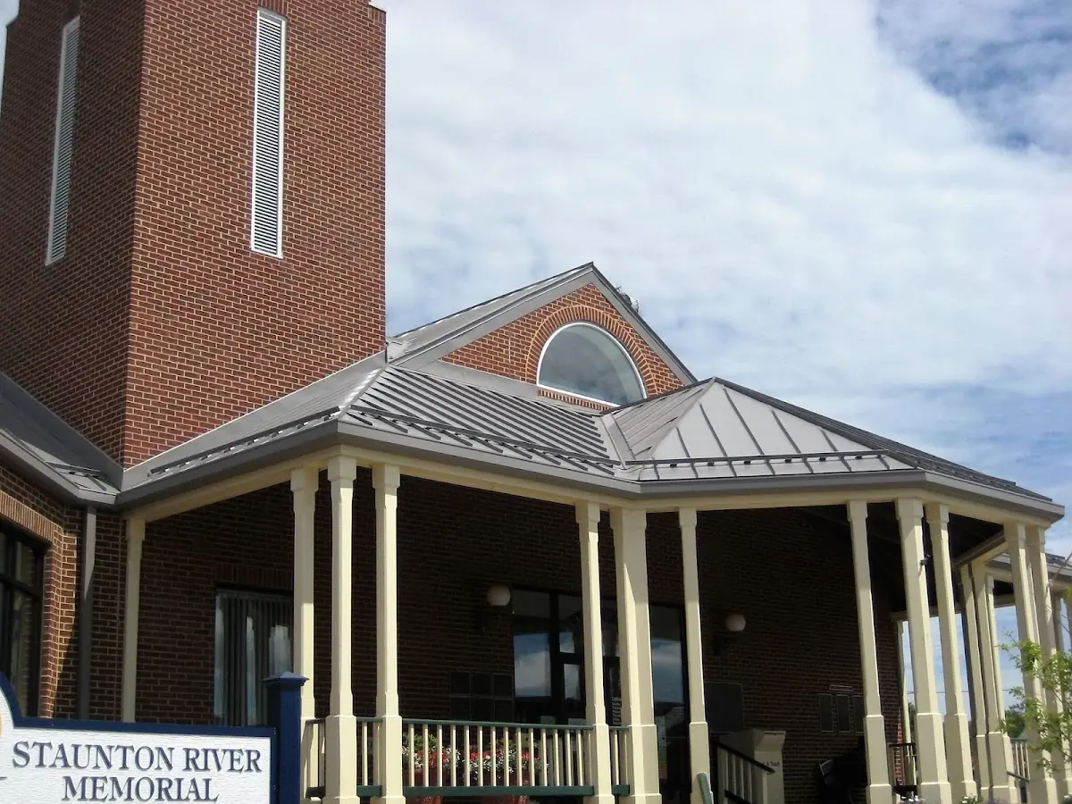 Skilled roofing craftsmen working on a residential roof in Northwest Commerce